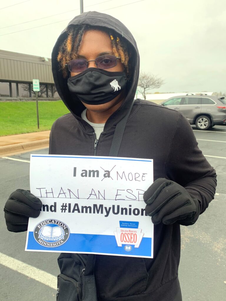 Osseo ESP member and negotiator Sieara Washington rallied with fellow ESPs and educators from across the district in April before a school board meeting. 